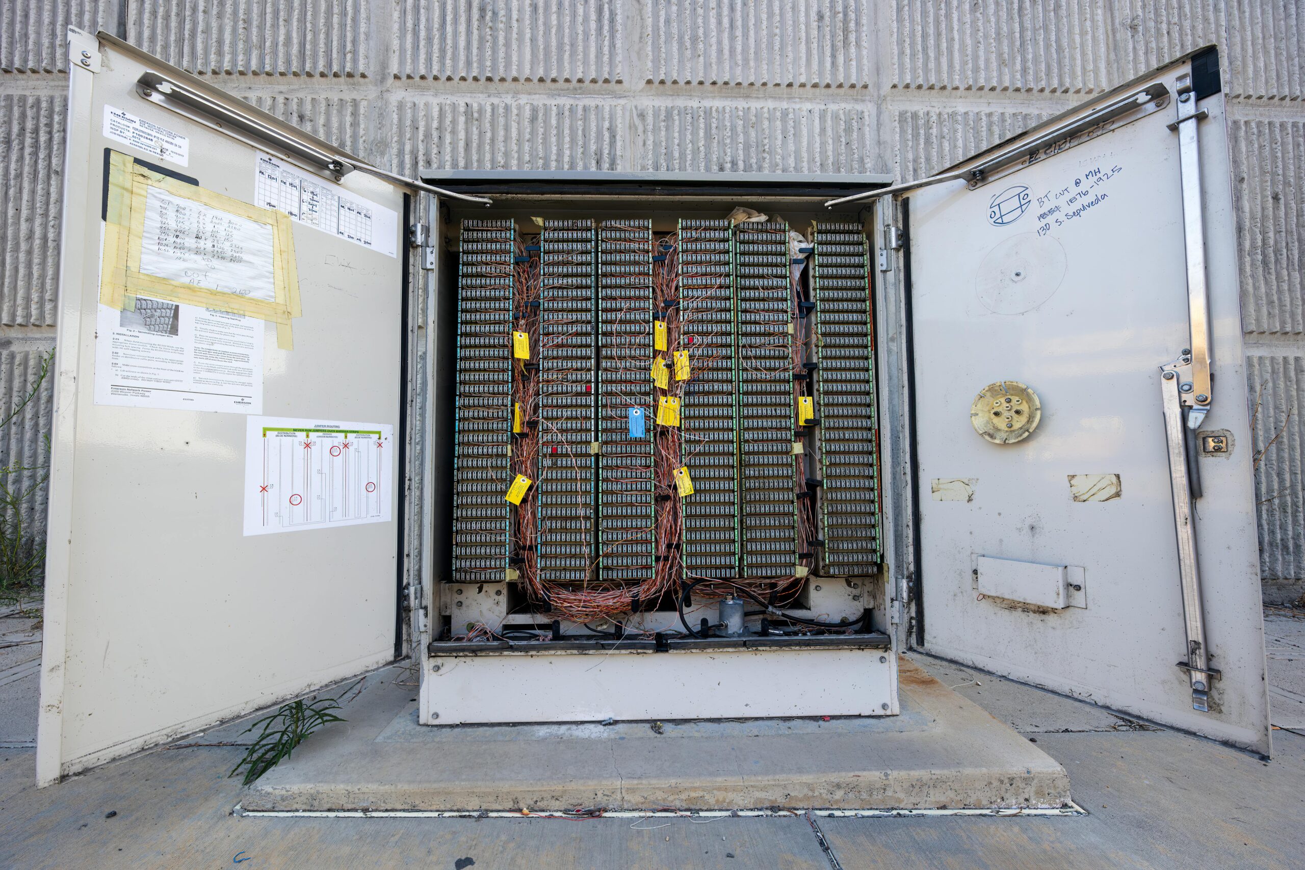 technician working with data or fiber cabling